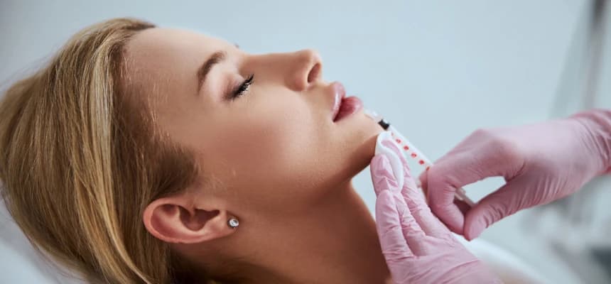 Modern aesthetics, woman receiving botox treatment.